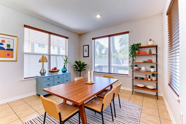 5002 Sawmill Terrace Ln, Spring, TX 77389 - dining space with plenty of natural light, light tile patterned floors, and recessed lighting
