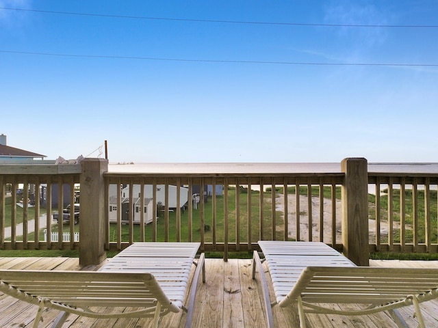1031 Rollover 2, Gilchrist, TX 77617 - wooden terrace with a lawn