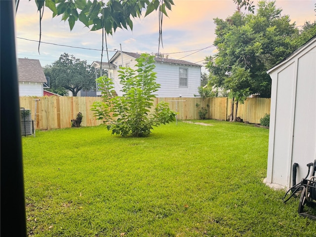4716 Siegel St, Houston, TX 77009 - yard at dusk featuring a fenced backyard