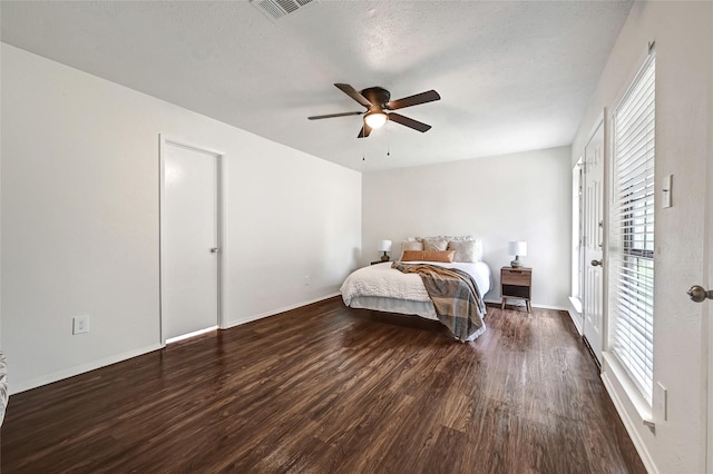 5518 Fair Forest Dr, Houston, TX 77088 - bedroom with wood finished floors and ceiling fan