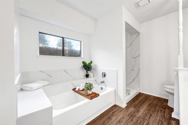 5518 Fair Forest Dr, Houston, TX 77088 - full bathroom featuring a bath, wood finished floors, and a shower
