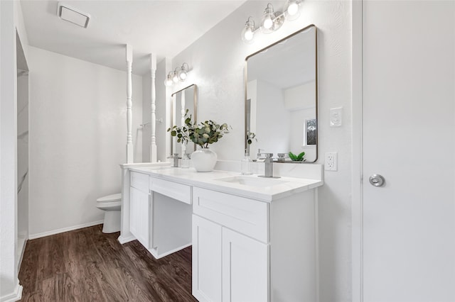 5518 Fair Forest Dr, Houston, TX 77088 - bathroom with double vanity and wood finished floors
