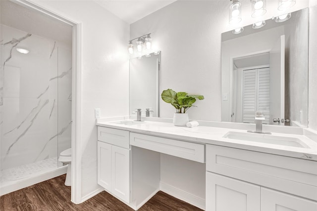 5518 Fair Forest Dr, Houston, TX 77088 - full bath featuring double vanity, a marble finish shower, and wood finished floors