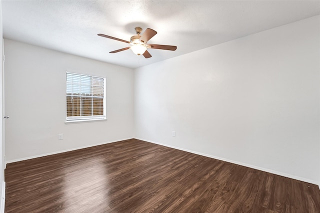 5518 Fair Forest Dr, Houston, TX 77088 - unfurnished room featuring dark wood-style floors and ceiling fan