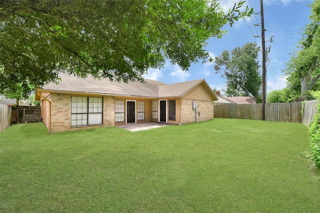 5518 Fair Forest Dr, Houston, TX 77088 - back of property with a fenced backyard and brick siding