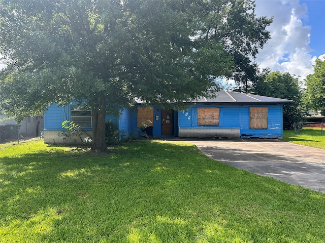 7706 Claiborne St, Houston, TX 77016 - obstructed view of property featuring driveway
