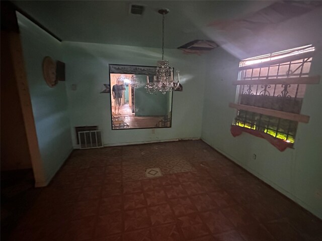 7706 Claiborne St, Houston, TX 77016 - unfurnished dining area featuring a chandelier