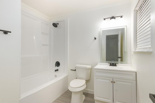 113 N Holmes St, La Porte, TX 77571 - bathroom featuring ornamental molding, vanity, bathtub / shower combination, and wood finished floors