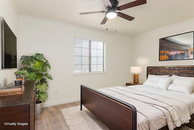 113 N Holmes St, La Porte, TX 77571 - bedroom with light wood-type flooring, ornamental molding, and ceiling fan