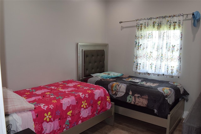 235 Rd 5253, Cleveland, TX 77327 - bedroom with wood finished floors