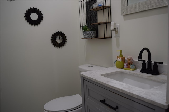 235 Rd 5253, Cleveland, TX 77327 - half bathroom featuring vanity and toilet