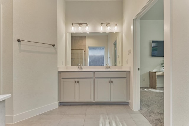 454 Glacier Pass, Montgomery, TX 77316 - bathroom featuring double vanity, tile patterned floors, and a shower