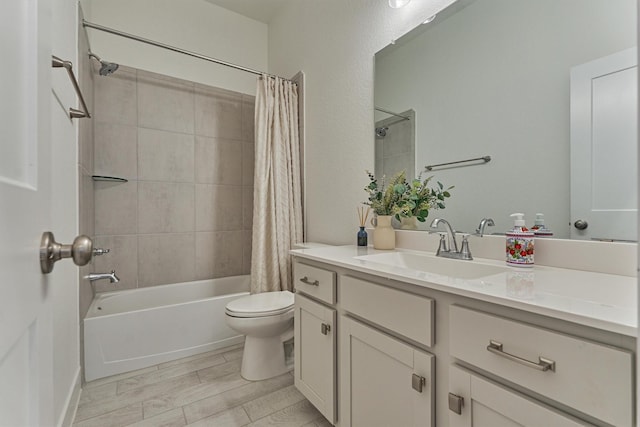 454 Glacier Pass, Montgomery, TX 77316 - bathroom with vanity, shower / bathtub combination with curtain, and wood finished floors