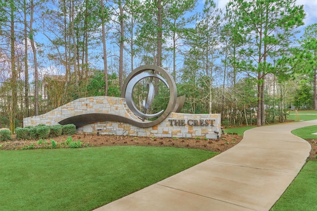454 Glacier Pass, Montgomery, TX 77316 - community / neighborhood sign featuring a yard