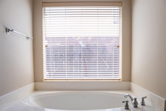 8855 Distant Woods Dr, Houston, TX 77095 - full bath featuring a bath and healthy amount of natural light