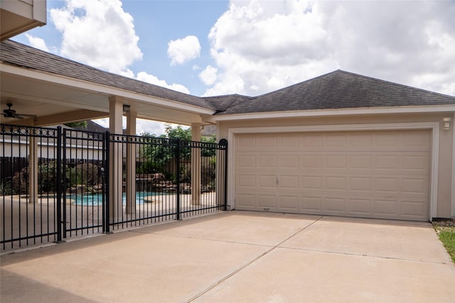8855 Distant Woods Dr, Houston, TX 77095 - view of side of property featuring driveway, a garage, and stucco siding