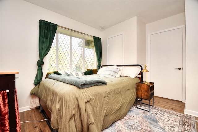2019 N Thompson St, Conroe, TX 77301 - bedroom featuring wood finished floors