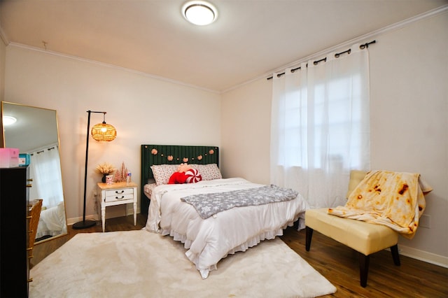 2019 N Thompson St, Conroe, TX 77301 - bedroom featuring crown molding and wood finished floors