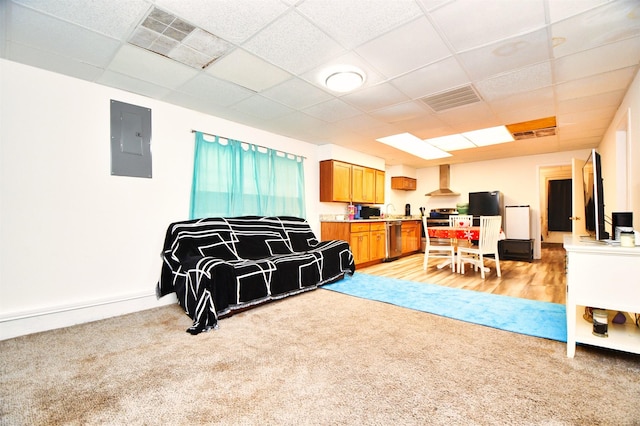 2019 N Thompson St, Conroe, TX 77301 - living room featuring electric panel, light carpet, and a drop ceiling