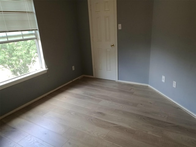 16623 Newglen Ln, Houston, TX 77084 - spare room featuring wood finished floors and baseboards