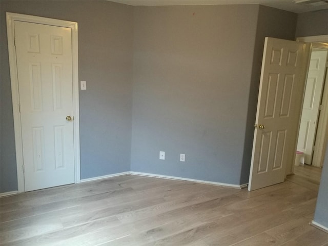 16623 Newglen Ln, Houston, TX 77084 - spare room featuring light wood-type flooring and baseboards