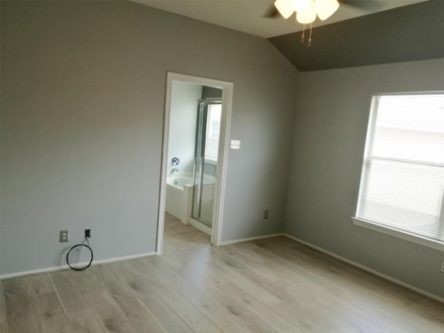 16623 Newglen Ln, Houston, TX 77084 - empty room featuring ceiling fan, light wood-style flooring, and lofted ceiling