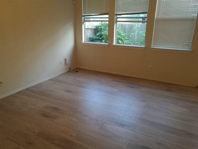 16623 Newglen Ln, Houston, TX 77084 - unfurnished room featuring hardwood / wood-style flooring and baseboards