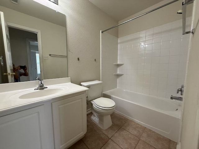 16623 Newglen Ln, Houston, TX 77084 - full bathroom featuring vanity, bathtub / shower combination, tile patterned floors, and a textured wall