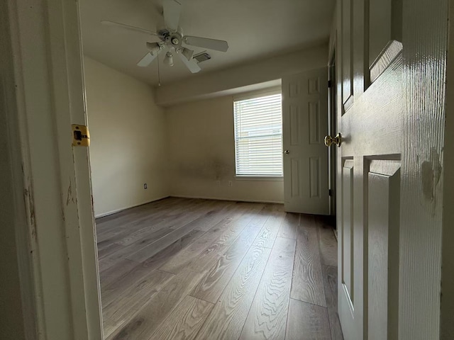 16623 Newglen Ln, Houston, TX 77084 - unfurnished room with hardwood / wood-style floors and a ceiling fan