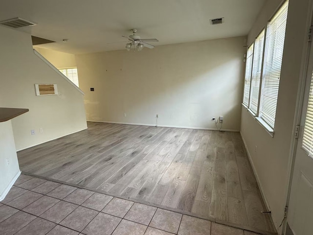 16623 Newglen Ln, Houston, TX 77084 - unfurnished living room featuring a ceiling fan and wood finished floors