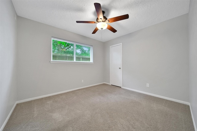 24193 Kelly St, Porter, TX 77365 - carpeted spare room featuring ceiling fan and a textured ceiling