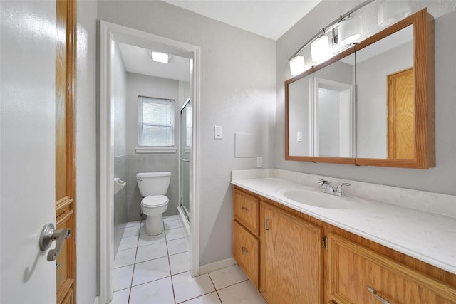24193 Kelly St, Porter, TX 77365 - bathroom with tile patterned floors, vanity, and a stall shower