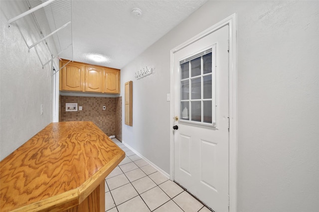 24193 Kelly St, Porter, TX 77365 - doorway featuring light tile patterned floors