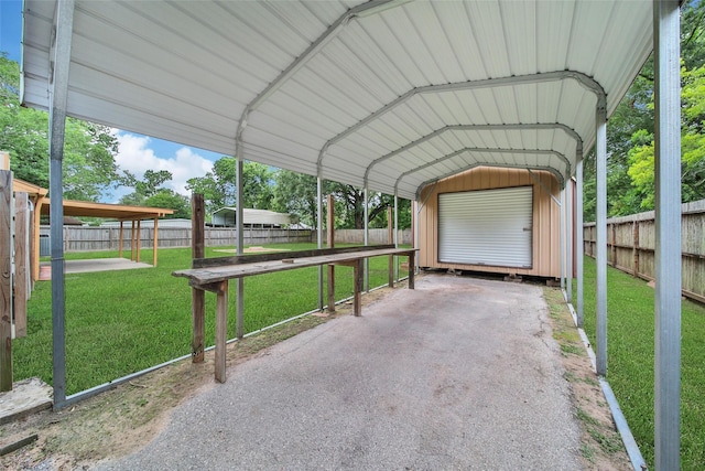 24193 Kelly St, Porter, TX 77365 - view of vehicle parking featuring a detached carport