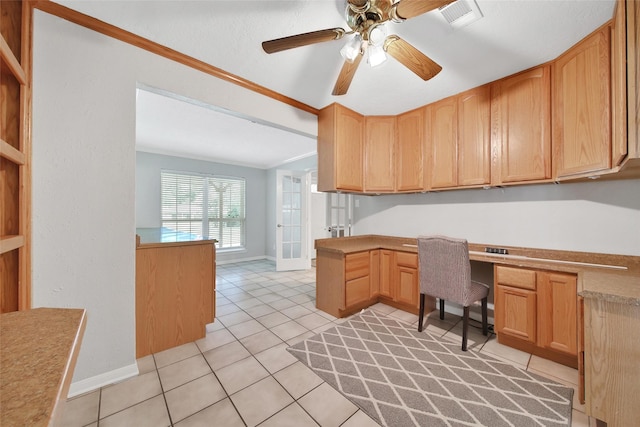 24193 Kelly St, Porter, TX 77365 - office featuring built in desk, light tile patterned floors, and a ceiling fan
