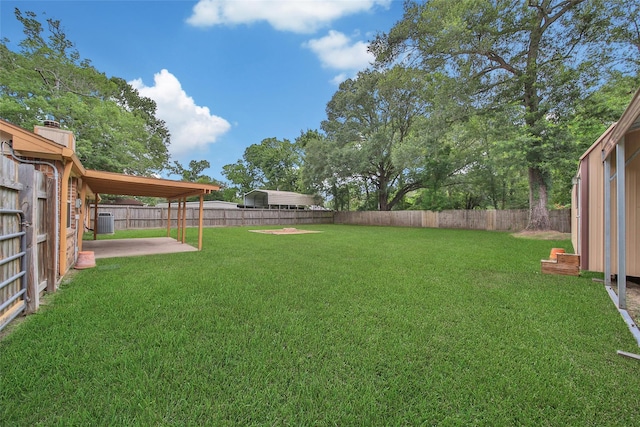 24193 Kelly St, Porter, TX 77365 - fenced backyard with a patio area