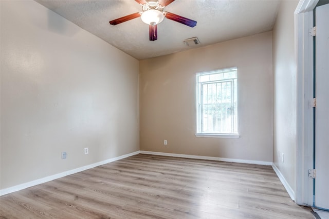 8130 Jutland Rd, Houston, TX 77033 - unfurnished room with light wood-style flooring and a ceiling fan