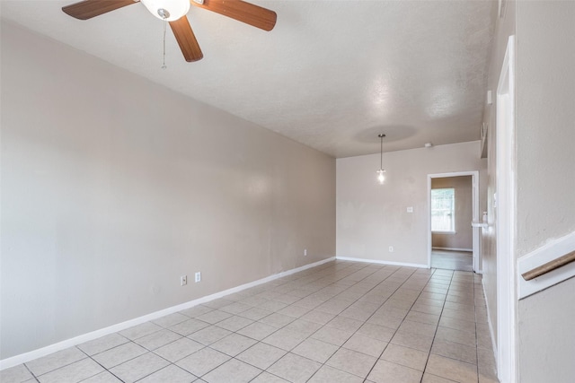 8130 Jutland Rd, Houston, TX 77033 - spare room featuring light tile patterned floors and a ceiling fan