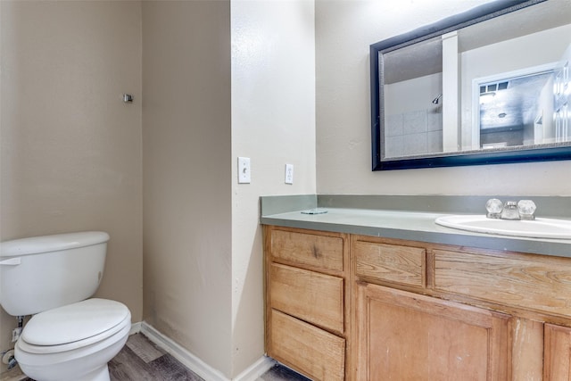 8130 Jutland Rd, Houston, TX 77033 - bathroom featuring vanity and wood finished floors