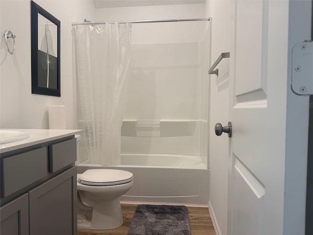 2944 Cordova Hill Dr, Katy, TX 77493 - full bathroom featuring wood finished floors, shower / bath combo with shower curtain, and vanity
