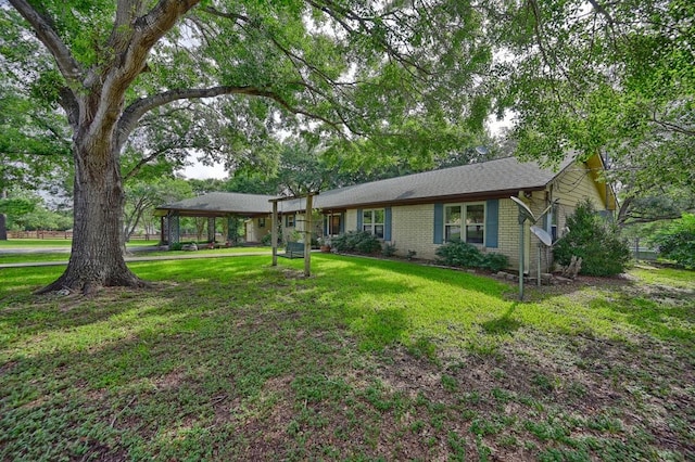 5425 Sandy Creek Ln, Brenham, TX 77833 - view of front of property featuring a front yard and brick siding