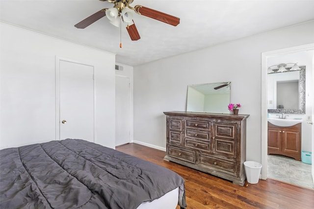 7730 Wickersham Pl, Beaumont, TX 77706 - bedroom with wood finished floors, ensuite bath, and ceiling fan