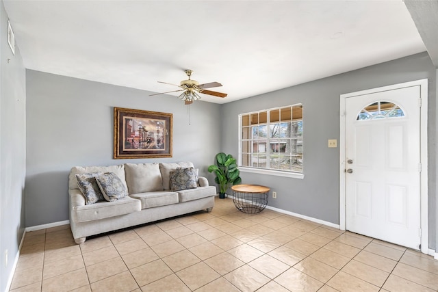 7730 Wickersham Pl, Beaumont, TX 77706 - foyer entrance with ceiling fan and light tile patterned floors
