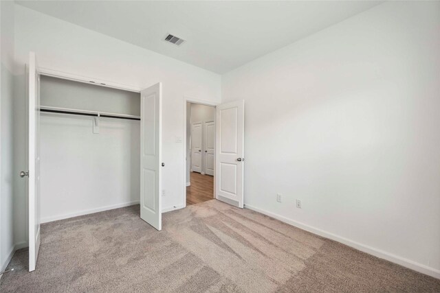 2539 Blazing Star Dr, Brookshire, TX 77423 - unfurnished bedroom featuring carpet flooring and a closet
