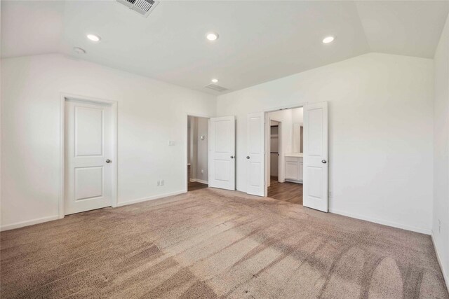 2539 Blazing Star Dr, Brookshire, TX 77423 - unfurnished bedroom with carpet flooring, lofted ceiling, and recessed lighting