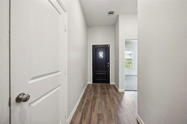 2539 Blazing Star Dr, Brookshire, TX 77423 - entryway with dark wood-style flooring and baseboards