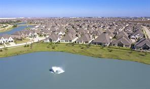 2539 Blazing Star Dr, Brookshire, TX 77423 - aerial view of residential area featuring a large body of water