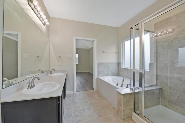 19823 White Pearl Ct, Houston, TX 77073 - bathroom featuring a garden tub, double vanity, and a shower stall