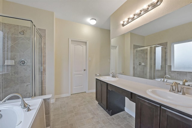 19823 White Pearl Ct, Houston, TX 77073 - full bathroom featuring double vanity, a shower stall, and a garden tub