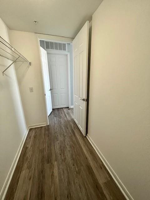 7575 Kirby Dr Unit 2314, Houston, TX 77030 - hall featuring dark wood-type flooring and baseboards